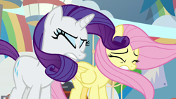 Size: 1280x720 | Tagged: safe, screencap, fluttershy, rarity, pegasus, pony, unicorn, she's all yak, windswept mane