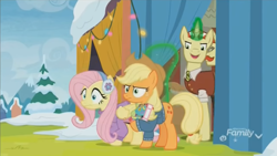 Size: 1348x758 | Tagged: safe, screencap, applejack, flam, flim, fluttershy, earth pony, pegasus, pony, best gift ever, clothes, curtain, discovery family logo, earmuffs, flag, flim flam brothers, holly the hearths warmer doll, levitation, magic, rainbow, scarf, sweater, telekinesis