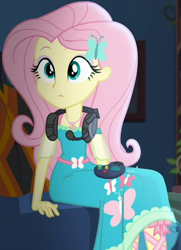 Size: 582x805 | Tagged: safe, screencap, fluttershy, costume conundrum, equestria girls, equestria girls series, spoiler:choose your own ending (season 2), spoiler:eqg series (season 2), controller, cropped, cute, female, geode of fauna, headphones, headset mic, magical geodes, shyabetes, sitting, solo, sunset's apartment