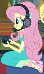 Size: 331x554 | Tagged: safe, screencap, fluttershy, costume conundrum, equestria girls, equestria girls series, spoiler:eqg series (season 2), controller, cropped, cute, feet, gamer fluttershy, headphones, headset, headset mic, sandals, sitting, solo focus, tongue out