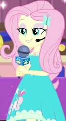 Size: 229x421 | Tagged: safe, screencap, fluttershy, best in show: the victory lap, better together, equestria girls, cropped, eyeshadow, female, geode of fauna, headset, headset mic, lidded eyes, magical geodes, makeup, microphone, smiling, solo