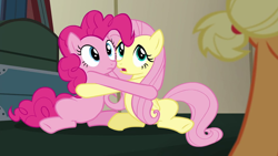 Size: 1050x591 | Tagged: safe, screencap, applejack, fluttershy, pinkie pie, earth pony, pegasus, pony, buckball season, cute, female, hug, mare, out of context, shipping fuel