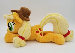 Size: 710x503 | Tagged: safe, artist:lunarchik13, applejack, earth pony, pony, applejack's hat, beanie (plushie), cowboy hat, female, hat, irl, mare, photo, plushie, prone, solo