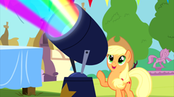 Size: 2880x1617 | Tagged: safe, screencap, applejack, earth pony, pony, pinkie pride, colored lights, cute, female, fountain, jackabetes, light, mare, rainbow, raised hoof, solo, statue