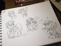 Size: 1200x900 | Tagged: safe, artist:whitediamonds, applejack, rarity, earth pony, pony, arrow, blanket, bow (weapon), bow and arrow, cupid, female, heart, irl, lesbian, mud, muddy, photo, rarijack, scrunchy face, shipping, sketch, sketchbook, traditional art