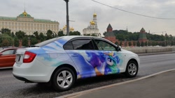 Size: 1024x576 | Tagged: safe, artist:cannibalus, princess celestia, car, decal, frown, glare, irl, itasha, kremlin, moscow, photo, pretty, russia, skoda, skoda rapid, spread wings