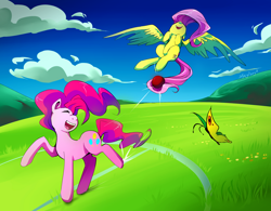 Size: 1500x1172 | Tagged: safe, artist:skyeypony, fluttershy, pinkie pie, butterfly, earth pony, pegasus, pony, buckball season, action shot, ball, buckball, cloud, cutie mark, duo, field, flying, fun, fur, grass, happy, kicking, mountain, nose in the air, pink fur, pink hair, playing, sky, smiling, teeth, tongue out