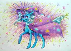 Size: 1200x865 | Tagged: safe, artist:weird--fish, trixie, pony, unicorn, cape, clothes, female, glowing horn, hat, mare, raised hoof, smiling, solo