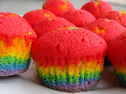 Size: 540x405 | Tagged: safe, derpibooru import, barely pony related, cupcake, photo, rainbow, rainbow cupcake