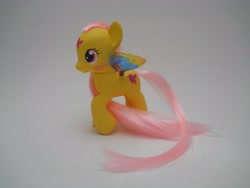 Size: 4320x3240 | Tagged: safe, artist:tiellanicole, derpibooru import, little flitter, pony, g1, custom, g1 to g4, generation leap, irl, photo, solo, summer wing ponies, toy