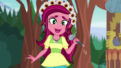 Size: 1280x720 | Tagged: safe, screencap, gloriosa daisy, equestria girls, legend of everfree, awkward, magical geodes, microphone, poker face, smiling, solo