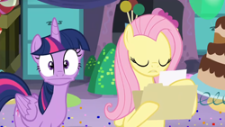 Size: 1600x900 | Tagged: safe, screencap, fluttershy, twilight sparkle, twilight sparkle (alicorn), alicorn, pegasus, pony, party pooped, :, balloon, cake, confetti, coward, eyes closed, faic, female, file, food, hoof hold, looking at you, mare, party cave, reading, they're just so cheesy, twiwimp sparkle