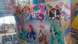 Size: 1280x720 | Tagged: safe, derpibooru import, centaur, equestria girls, bootleg, doll, equestria girls logo, irl, monster high, photo, toy