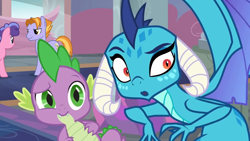 Size: 1280x720 | Tagged: safe, derpibooru import, screencap, princess ember, spike, dragon, earth pony, pony, school daze, background pony, confused, dragoness, female, male, mare, raised eyebrow, stallion