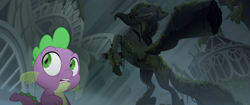 Size: 1920x804 | Tagged: safe, derpibooru import, screencap, spike, dragon, my little pony: the movie, hippogriffia, male, mount aris, scared, solo, statue