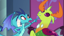 Size: 1280x720 | Tagged: safe, derpibooru import, screencap, princess ember, thorax, changedling, changeling, dragon, school daze, accusation, changeling king, duo, king thorax, lip bite, pointing, scared, suspect, threatening