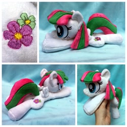 Size: 1600x1600 | Tagged: safe, artist:equinepalette, derpibooru import, blossomforth, pegasus, pony, beanie (plushie), female, hand, irl, mare, photo, plushie, prone, solo, spread wings, wings