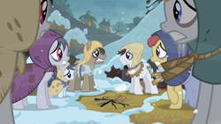 Size: 1280x720 | Tagged: safe, derpibooru import, screencap, doctor whooves, flurry, lucky clover, shady daze, earth pony, pony, hearth's warming eve (episode), amaranthine, background pony, bags under eyes, burlap, charcoal bakes, cold, dry wheat, earth pony tribe, female, filly, hearth's warming eve, male, mare, peasant, rags, snow, stallion
