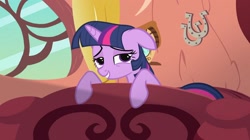 Size: 1776x998 | Tagged: safe, derpibooru import, screencap, twilight sparkle, secret of my excess, bed, golden oaks library, grin, smiling, solo