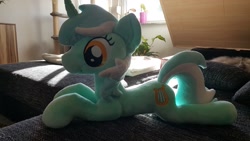 Size: 1063x598 | Tagged: safe, artist:varonya, lyra heartstrings, pony, unicorn, irl, photo, plushie, prone, solo