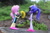 Size: 6000x4000 | Tagged: safe, artist:artofmagicpoland, derpibooru import, fluttershy, sci-twi, twilight sparkle, better together, equestria girls, clothes, dandelion, doll, equestria girls minis, female, flippers, flower, holding, lesbian, sandals, scitwishy, shipping, swimsuit, toy, twishy