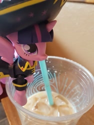 Size: 3024x4032 | Tagged: safe, derpibooru import, twilight sparkle, twilight sparkle (alicorn), alicorn, big sip, coffee, drinking, guardians of harmony, iced coffee, irl, merchandise, misadventures of the guardians, photo, pirate, straw, toy