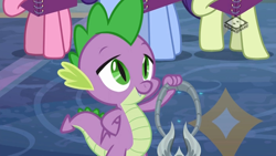 Size: 1024x576 | Tagged: safe, derpibooru import, screencap, spike, dragon, the end in friend, amulet, amulet of aurora, azurantium, boomerang (tv channel), jewelry, male, solo focus, winged spike