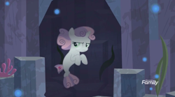 Size: 1440x800 | Tagged: safe, derpibooru import, screencap, sweetie belle, seapony (g4), surf and/or turf, brooding, cave, female, filly, grumpy belle, sea-mcs, seaponified, seapony sweetie belle, solo, species swap, underwater