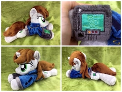 Size: 1600x1200 | Tagged: safe, artist:equinepalette, derpibooru import, oc, oc only, oc:littlepip, pony, unicorn, fallout equestria, beanie (plushie), clothes, cutie mark, fanfic, female, hand, hooves, horn, irl, mare, photo, pipbuck, plushie, prone, solo, vault suit