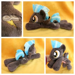 Size: 1600x1600 | Tagged: safe, artist:equinepalette, derpibooru import, thunderlane, pegasus, pony, beanie (plushie), hand, irl, male, photo, plushie, prone, solo, stallion