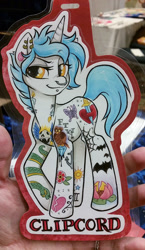 Size: 578x1000 | Tagged: safe, artist:onnanoko, oc, oc only, oc:clipcord, pony, unicorn, ear piercing, earring, female, jewelry, mare, nose piercing, photo, piercing, solo, tattoo, traditional art