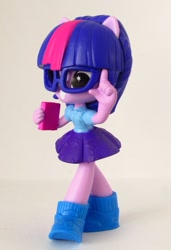 Size: 875x1277 | Tagged: safe, artist:whatthehell!?, derpibooru import, sci-twi, twilight sparkle, better together, equestria girls, book, clothes, doll, equestria girls minis, glasses, irl, photo, shoes, skirt, toy, ultra minis