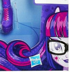 Size: 243x250 | Tagged: safe, screencap, sci-twi, twilight sparkle, equestria girls, friendship games, box, doll, glasses, hasbro logo, lipstick, looking at you, ponied up, smiling, solo, toy