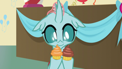 Size: 1280x720 | Tagged: safe, derpibooru import, screencap, ocellus, changedling, changeling, marks for effort, cupcake, cute, dessert, diaocelles, floppy ears, food, holding, school of friendship, smiling, solo