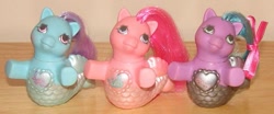 Size: 769x320 | Tagged: safe, merpony, g1, baby pearly, baby sea princess, baby sea shimmer, fancy mermaid ponies, irl, photo, toy, trio