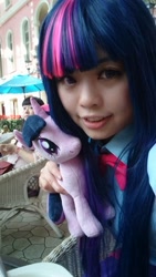 Size: 540x960 | Tagged: artist needed, safe, twilight sparkle, twilight sparkle (alicorn), alicorn, human, clothes, cosplay, costume, irl, irl human, photo, plushie