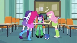 Size: 1100x618 | Tagged: safe, screencap, fluttershy, pinkie pie, rarity, twilight sparkle, equestria girls, equestria girls (movie), angry, backpack, book, boots, bracelet, classroom, clothes, high heel boots, incomplete twilight strong, jewelry, raised leg, skirt, television