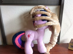 Size: 960x717 | Tagged: safe, twilight sparkle, pony, unicorn, 4de, alien (franchise), crossover, duo, facehugger, irl, photo, plushie, this will end in tears and/or death, xenomorph