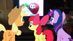 Size: 1696x956 | Tagged: safe, derpibooru import, apple bloom, applejack, twilight sparkle, earth pony, pony, television, veggietales, watching