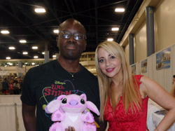 Size: 2853x2139 | Tagged: safe, human, angel (lilo and stitch), barely pony related, florida supercon, irl, irl human, lilo and stitch, photo, plushie, tara strong