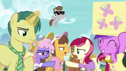 Size: 1920x1080 | Tagged: safe, screencap, amethyst star, caramel, dandy dispatch, meadow song, rainbowshine, roseluck, sparkler, earth pony, pegasus, pony, unicorn, fame and misfortune, animation error, background pony, baseball cap, cap, clothes, colt, female, foal, hat, magic, magic aura, male, mare, necktie, shirt, stallion, t-shirt, telekinesis