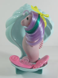 Size: 451x600 | Tagged: safe, derpibooru import, sea breeze (g1 sea pony), sea pony, g1, bow, brush, comb, hair bow, hair ribbon, shell, toy