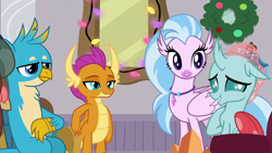 Size: 1280x720 | Tagged: safe, derpibooru import, screencap, gallus, ocellus, silverstream, smolder, yona, changedling, changeling, dragon, griffon, hippogriff, yak, the hearth's warming club, cute, diaocelles, diastreamies, dragoness, embarrassed, female, gallabetes, male, smolderbetes