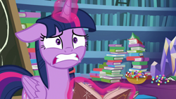 Size: 1280x720 | Tagged: safe, derpibooru import, screencap, twilight sparkle, twilight sparkle (alicorn), alicorn, best gift ever, book, bookshelf, candy, candy cane, chalkboard, floppy ears, food, glowing horn, levitation, magic, solo, telekinesis, worried