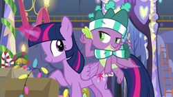 Size: 1280x720 | Tagged: safe, derpibooru import, screencap, spike, twilight sparkle, twilight sparkle (alicorn), alicorn, dragon, pony, best gift ever, christmas, christmas lights, clothes, duo, female, glowing horn, hat, holiday, magic, male, mare, scarf, stupid sexy spike, telekinesis, winged spike