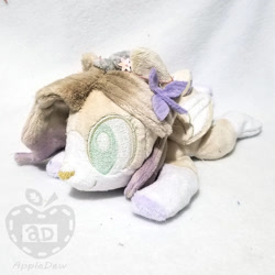 Size: 900x900 | Tagged: safe, artist:appledew, derpibooru import, oc, oc only, oc:belle, pegasus, pony, beanie (plushie), female, folded wings, irl, mare, photo, plushie, prone, solo, wings