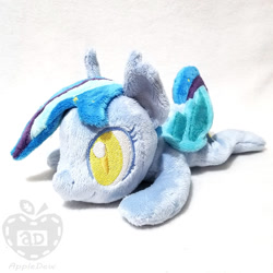 Size: 1000x1000 | Tagged: safe, artist:appledew, derpibooru import, oc, oc only, oc:star struck, bat pony, pony, bat wings, beanie (plushie), ear fluff, female, irl, mare, photo, plushie, prone, slit eyes, solo, wings