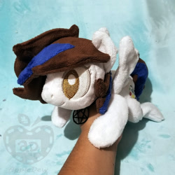 Size: 1000x1000 | Tagged: safe, artist:appledew, derpibooru import, oc, oc only, oc:rose bell, pegasus, pony, beanie (plushie), female, hand, irl, jewelry, mare, necklace, photo, plushie, prone, solo, wings