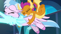 Size: 1280x720 | Tagged: safe, derpibooru import, screencap, silverstream, smolder, classical hippogriff, dragon, hippogriff, school raze, dragoness, duo, eyes closed, female, hand, magic, magic hands, out of context