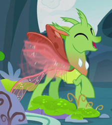 Size: 348x387 | Tagged: safe, derpibooru import, screencap, changedling, changeling, to change a changeling, background changeling, buzzing wings, cropped, eyes closed, happy, open mouth, raised hoof, solo, wings